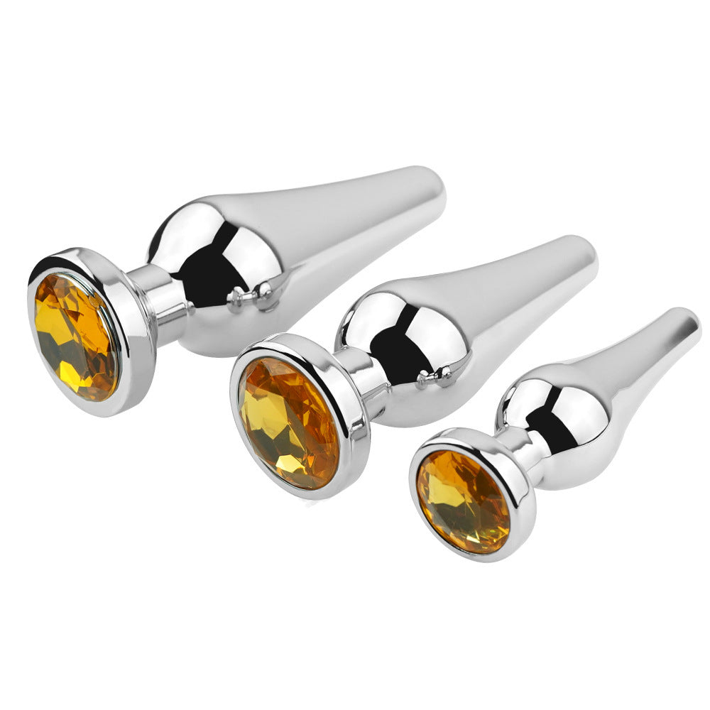 Tapered Metal Yellow Jewel Anal Plug